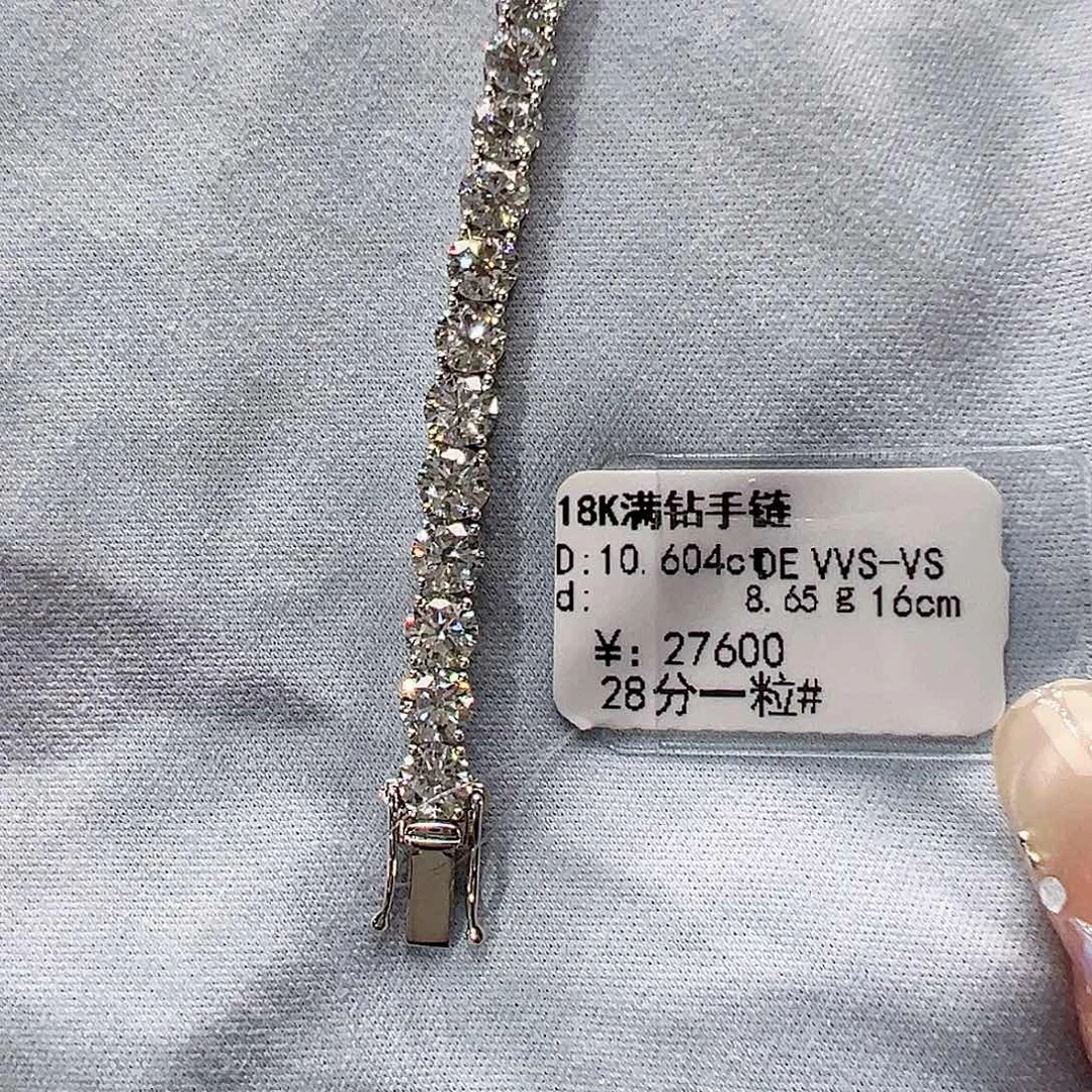 樱***樱18K金镶嵌套链实验室培育钻石单颗28分，网球款手链