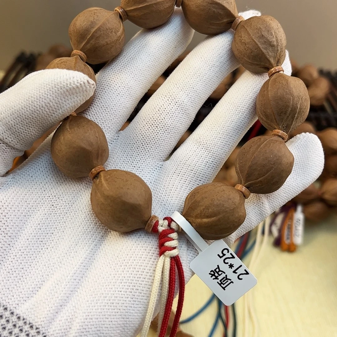 绮***e橄榄核吊坠梅林铁核文玩手串