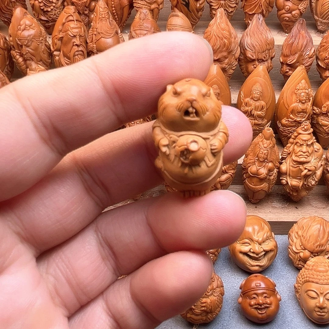 橄榄核吊坠18卡皮巴拉