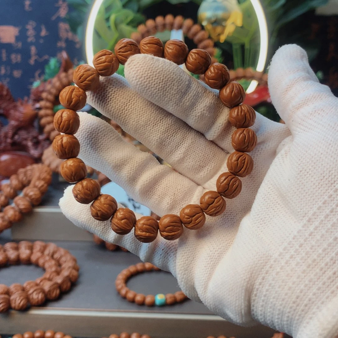 桃核吊坠能****生秦岭龙纹