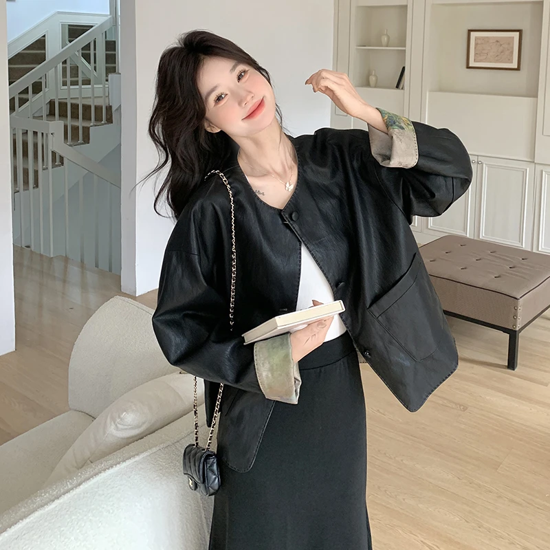 高级感黑色宽松中式国风皮衣外套女2025早春新款气质圆领长袖上衣