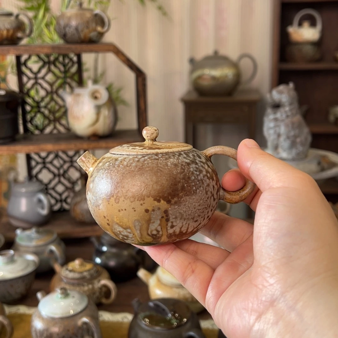 10中白重落灰西施壶