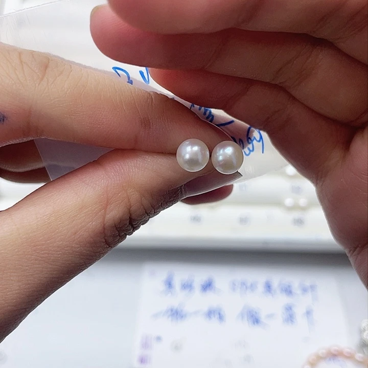 淡水珍珠耳饰银S925镶嵌一****?