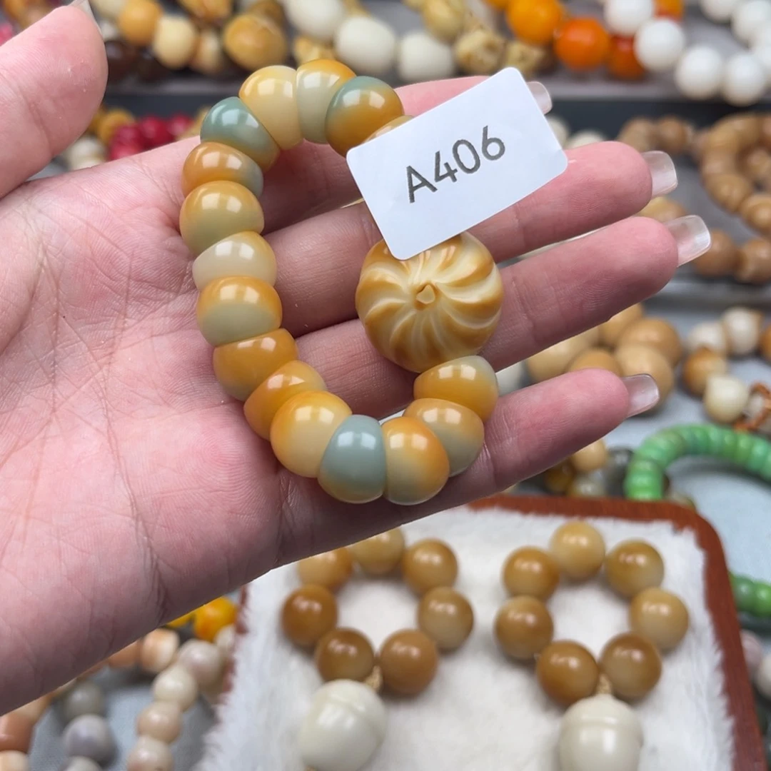 菩提根/象牙果吊坠福****店A406向日葵手捻卡13一串
