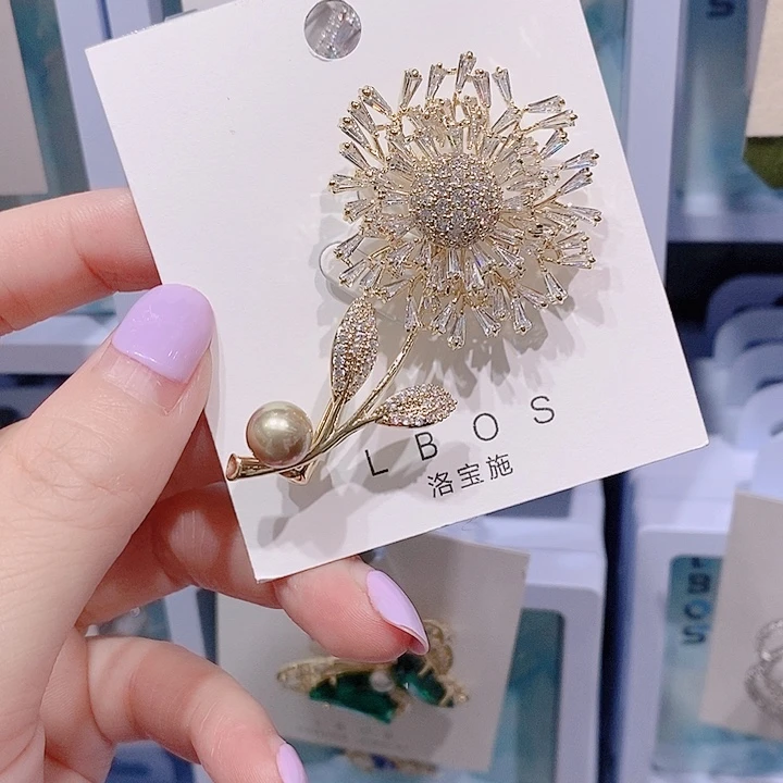 锆石铜合金太阳花胸针