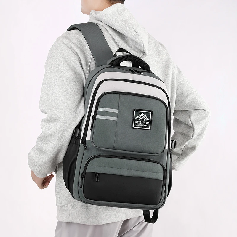 背负款工装风男士双肩包大学生百搭韩版防水背包