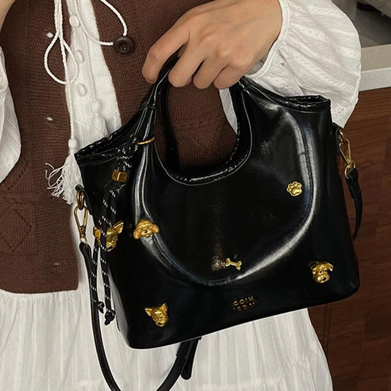 手提时尚镶嵌水桶包2025冬季新款高级感潮流百搭单肩包小众斜挎包