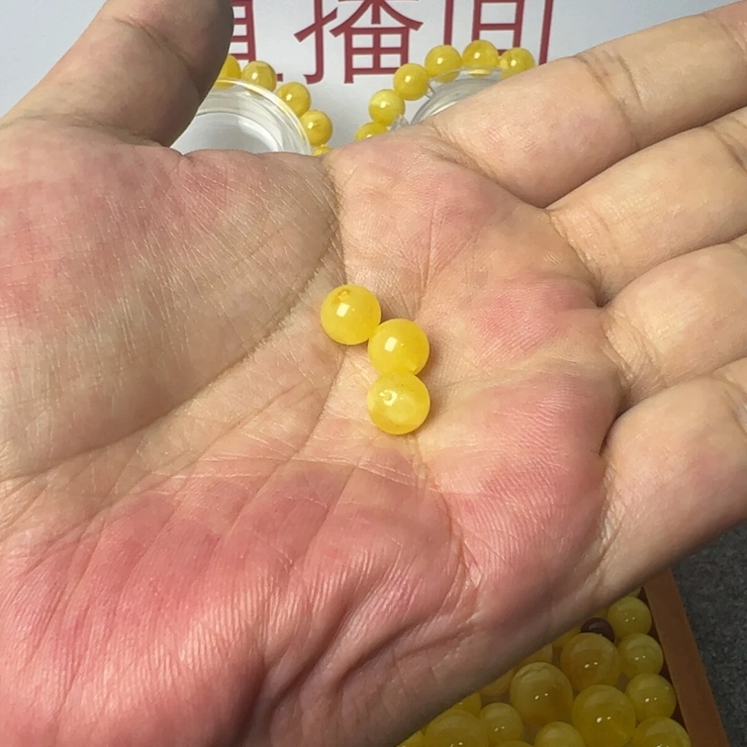 兔****琥珀未镶嵌裸石单珠8mm