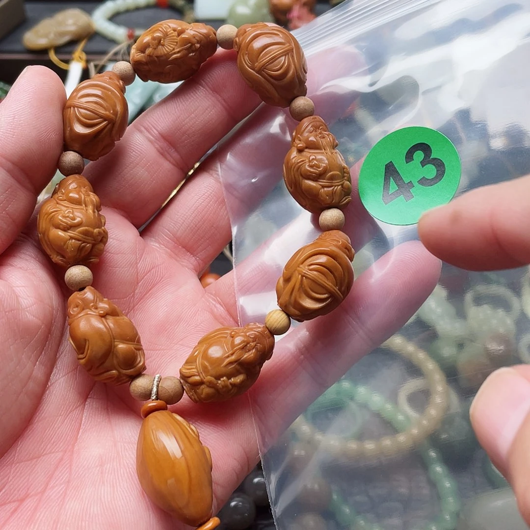 吊坠橄榄核小**品吊坠