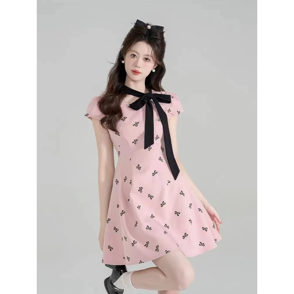 法式甜美粉色蝴蝶结收腰连衣裙女夏季高级感荷叶边盖袖a字裙短裙