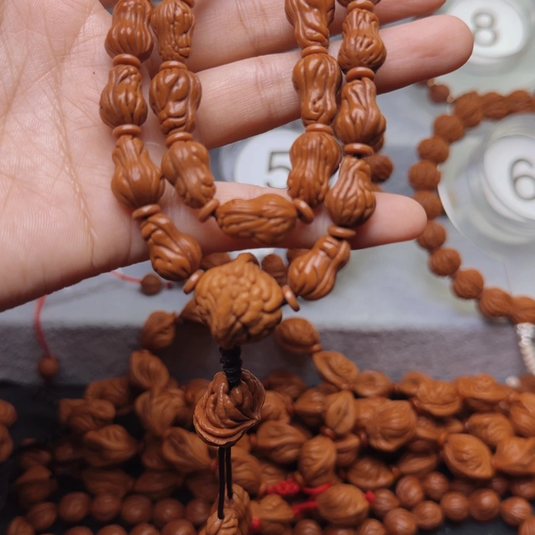 羅***.吊坠桃核龙纹桃核