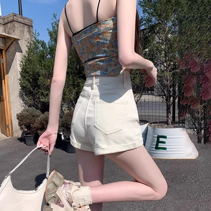 雪千羽白色小个子高腰弹力牛仔短裤女夏2025新款显瘦辣妹a字热裤