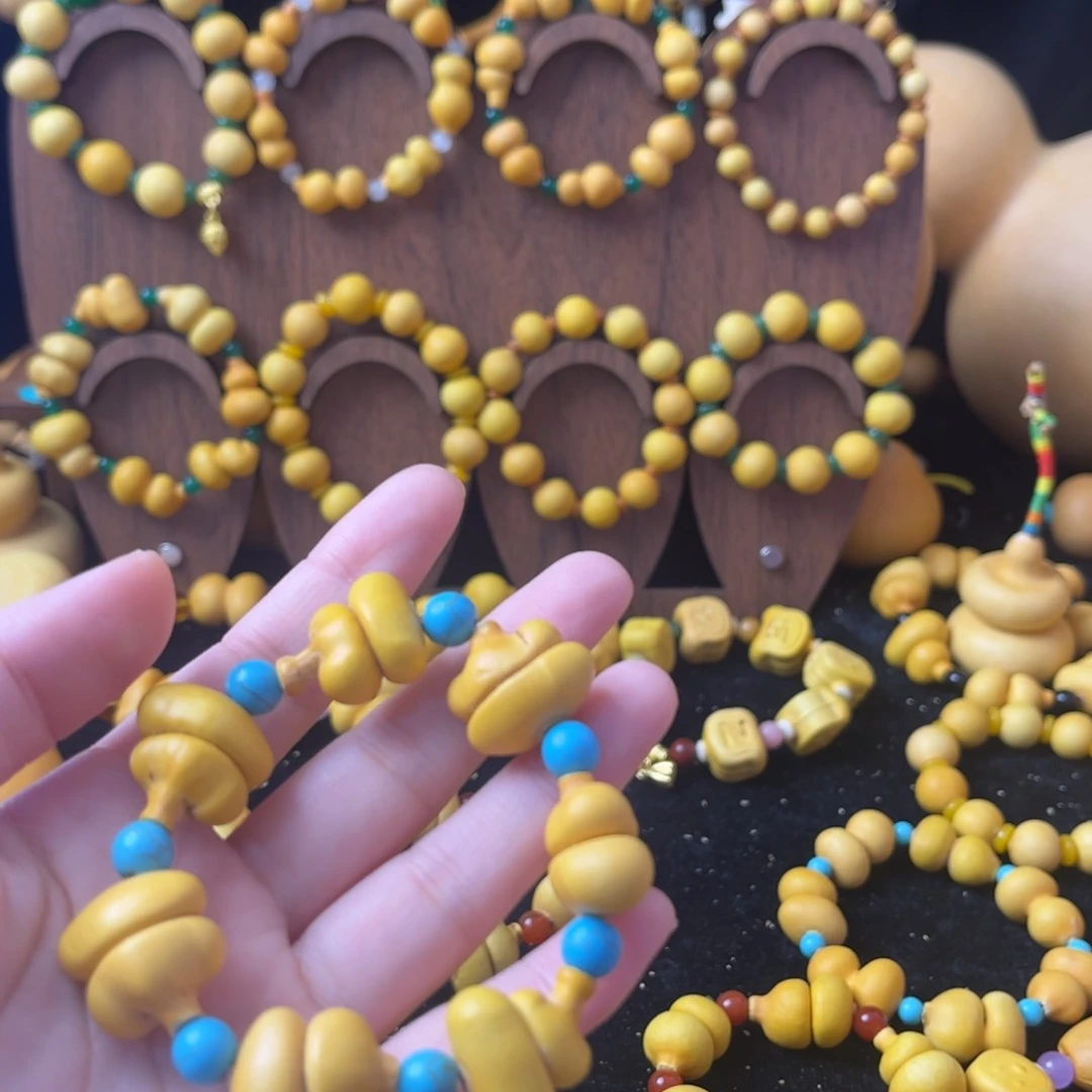 小*子七颗小熊脸钱袋手串