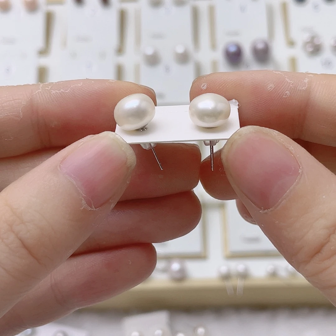 杉***迟银S925镶嵌淡水珍珠耳饰