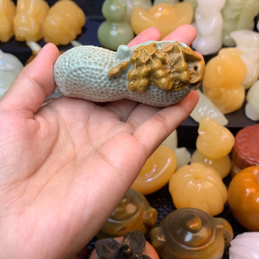 有***味五彩石手把件花生