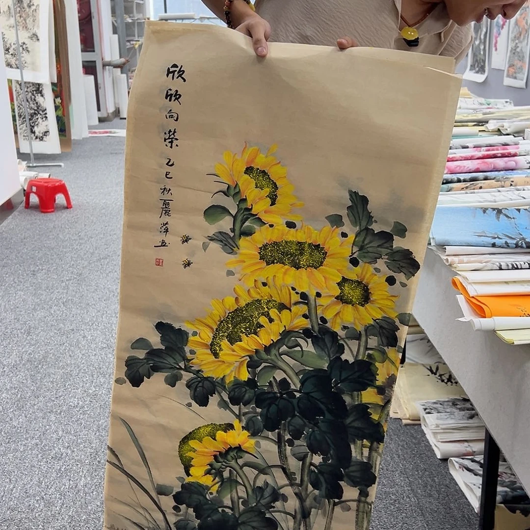 国画卖字画的小男孩