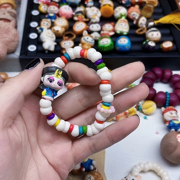 库克吊坠坨骨大肠手串