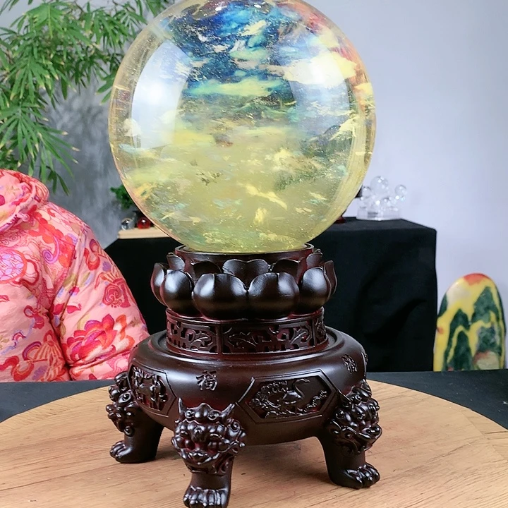 石材黄水晶球直径20带高档底座