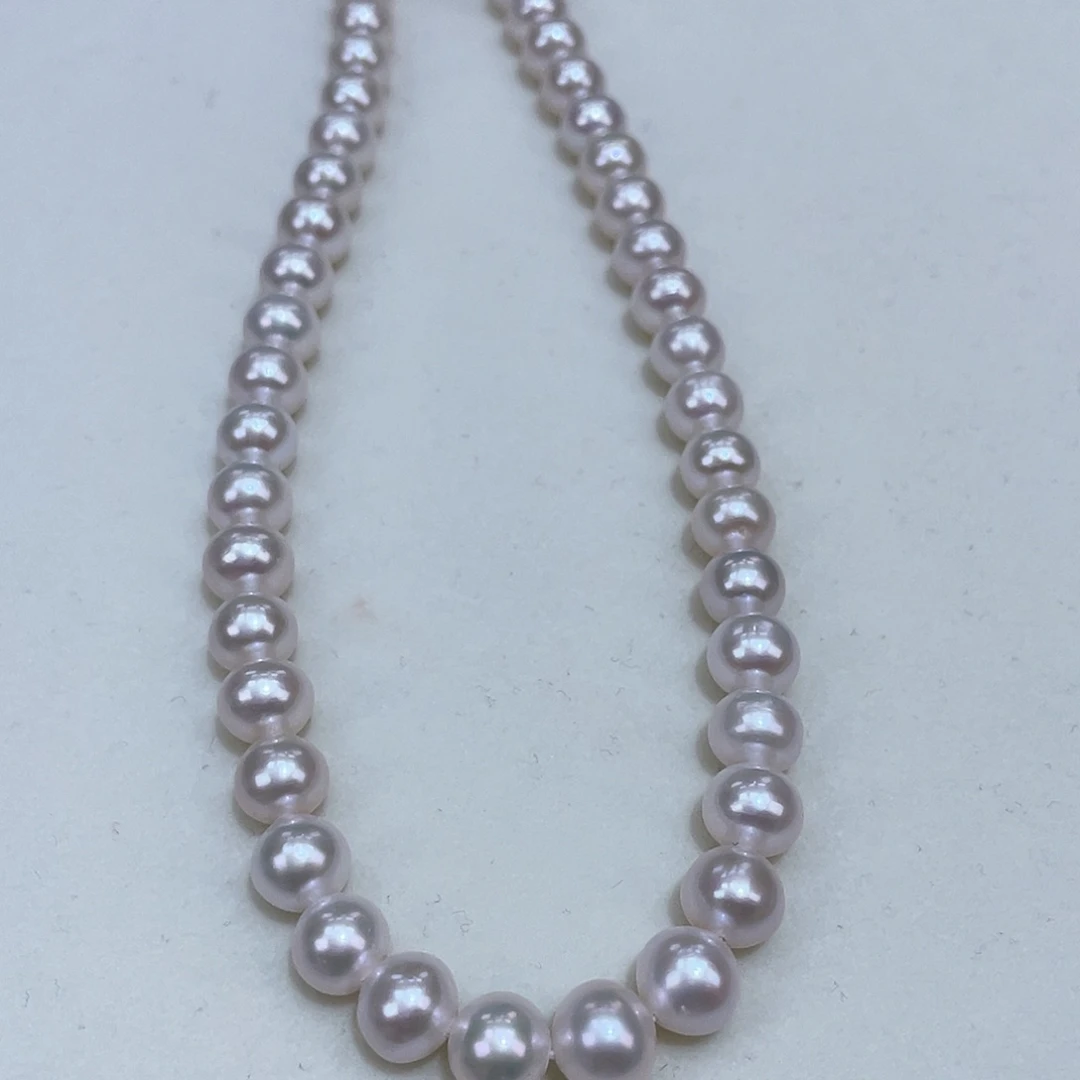 淡水珍珠7.5/8近圆镜面极光银S925镶嵌