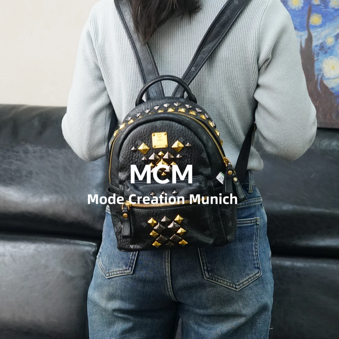 95新 MCM 黑金双肩包/TZ02812004/2004