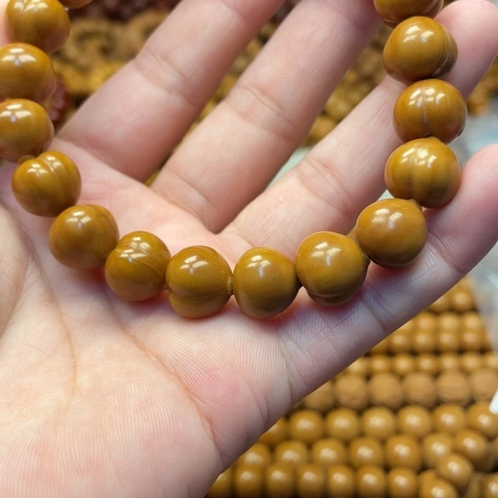 鱼****手串猴头核桃微瑕亮面小屁桃