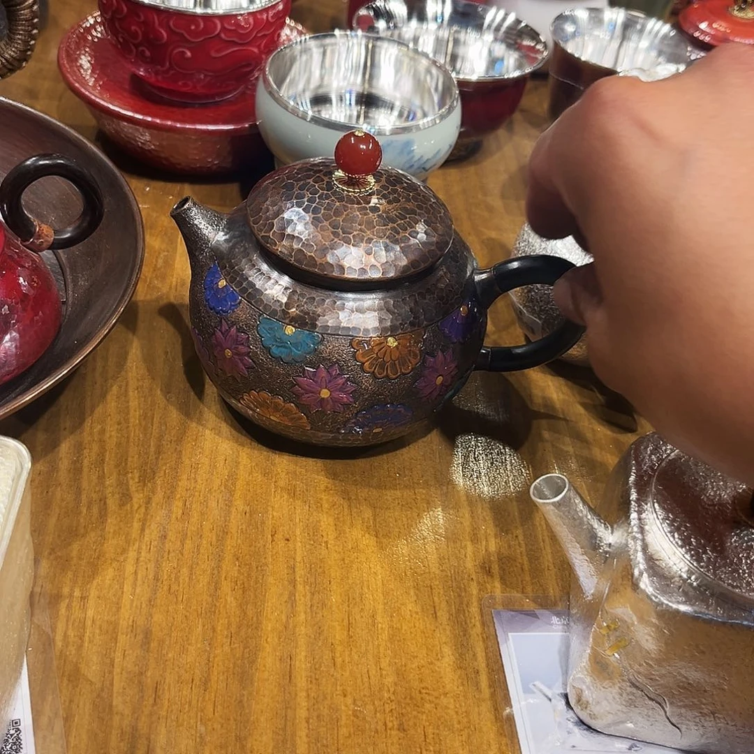 变色万花泡壶手工锻打工艺