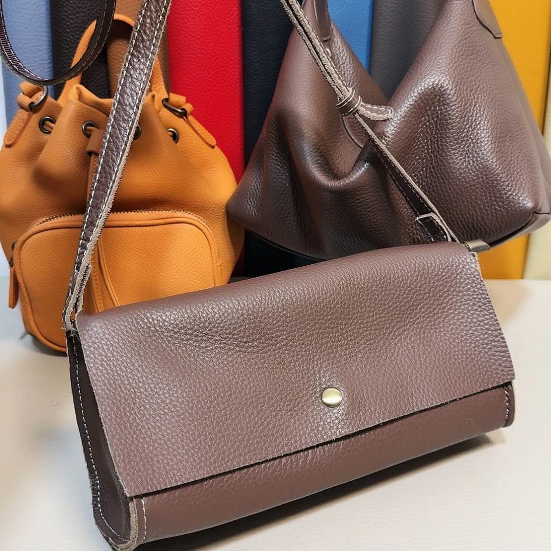 头层牛皮真皮法棍包