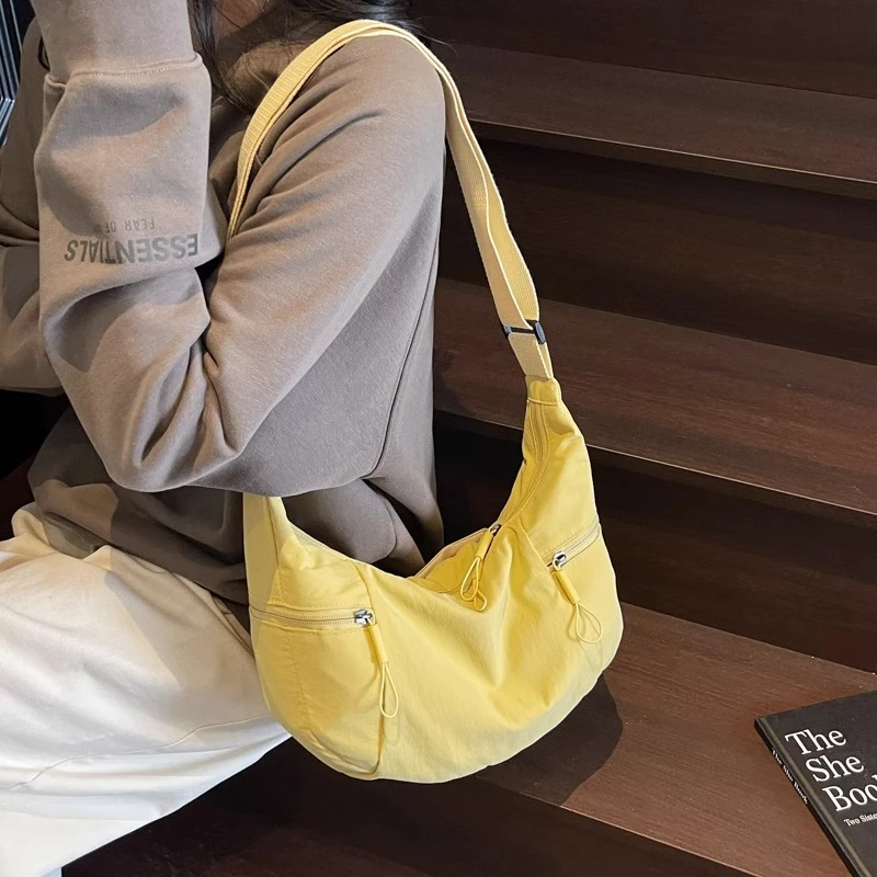 帆布包上班通勤高级感包包女大容量2025新款小众单肩斜挎包饺子包