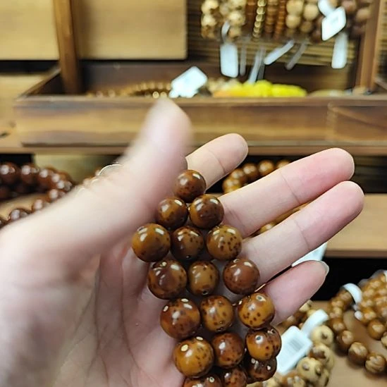 紫金鼠手串紫金鼠手串光珠黄皮