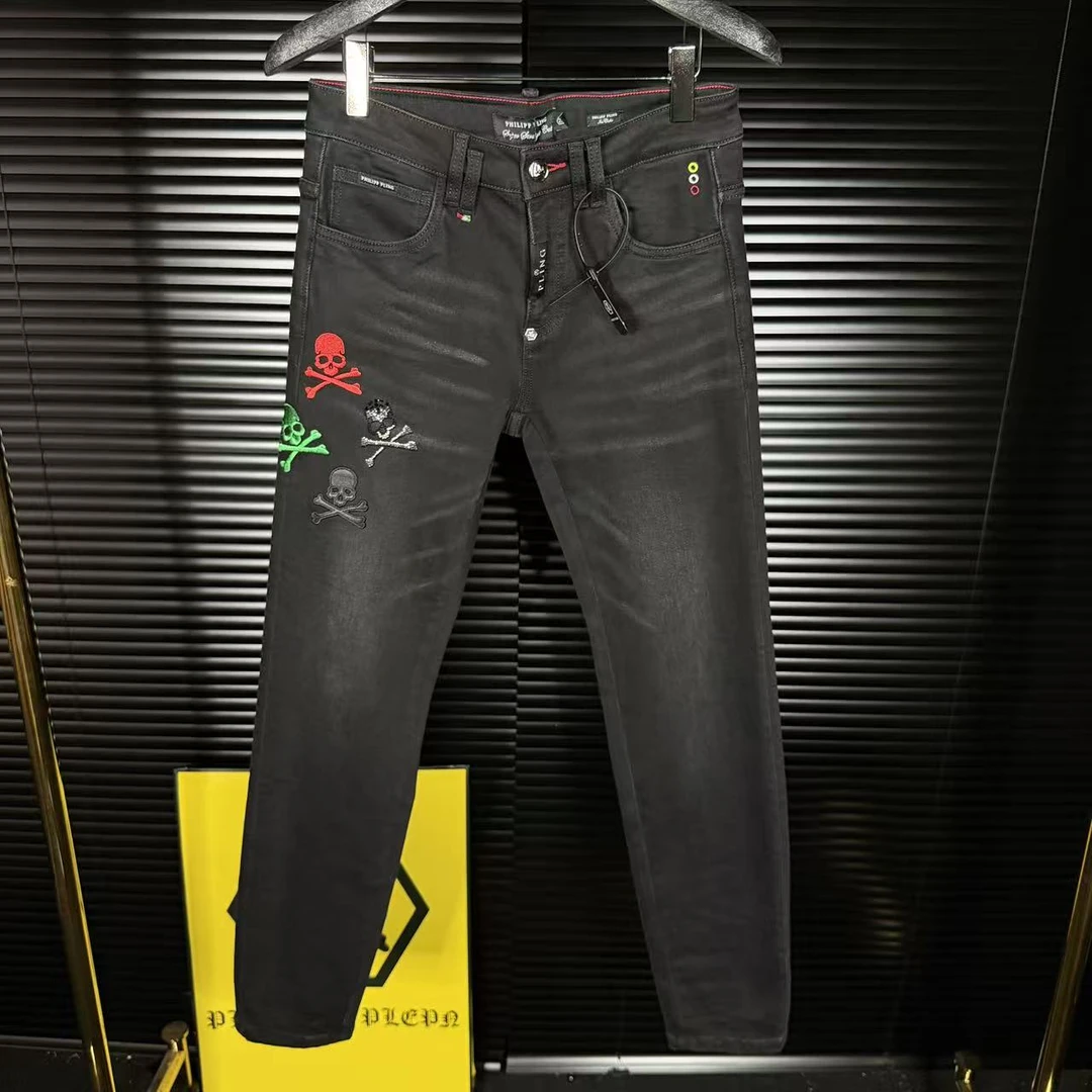 高品质欧货潮牌25男新款秋季小直脚烫钻骷髅头刺绣个性牛仔裤