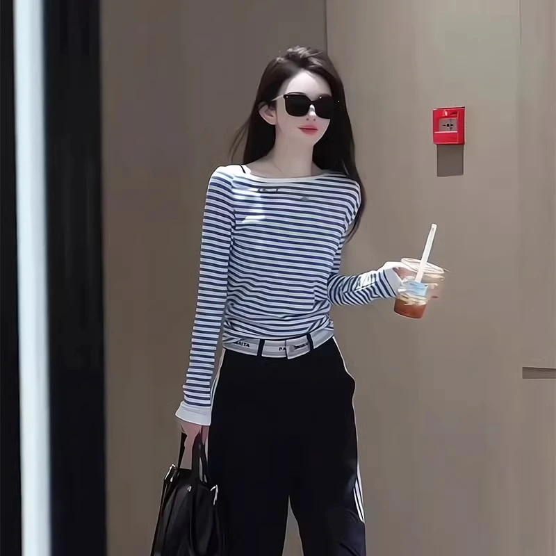 欧货时尚设计感斜肩蓝色条纹长袖T恤女2025春秋新款显瘦减龄上衣