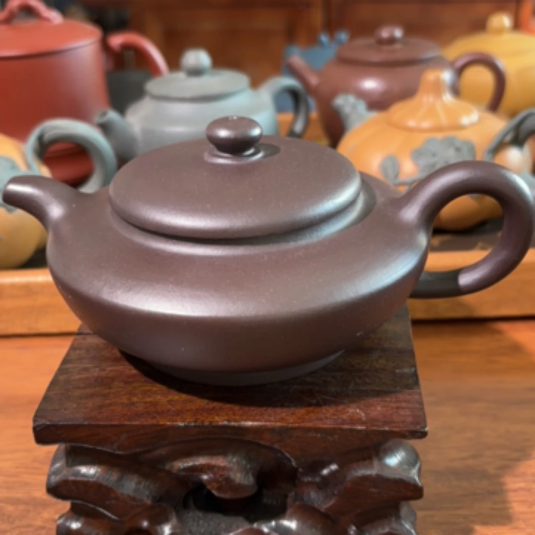 助理工艺师紫砂汉扁壶，代表谦逊和包容