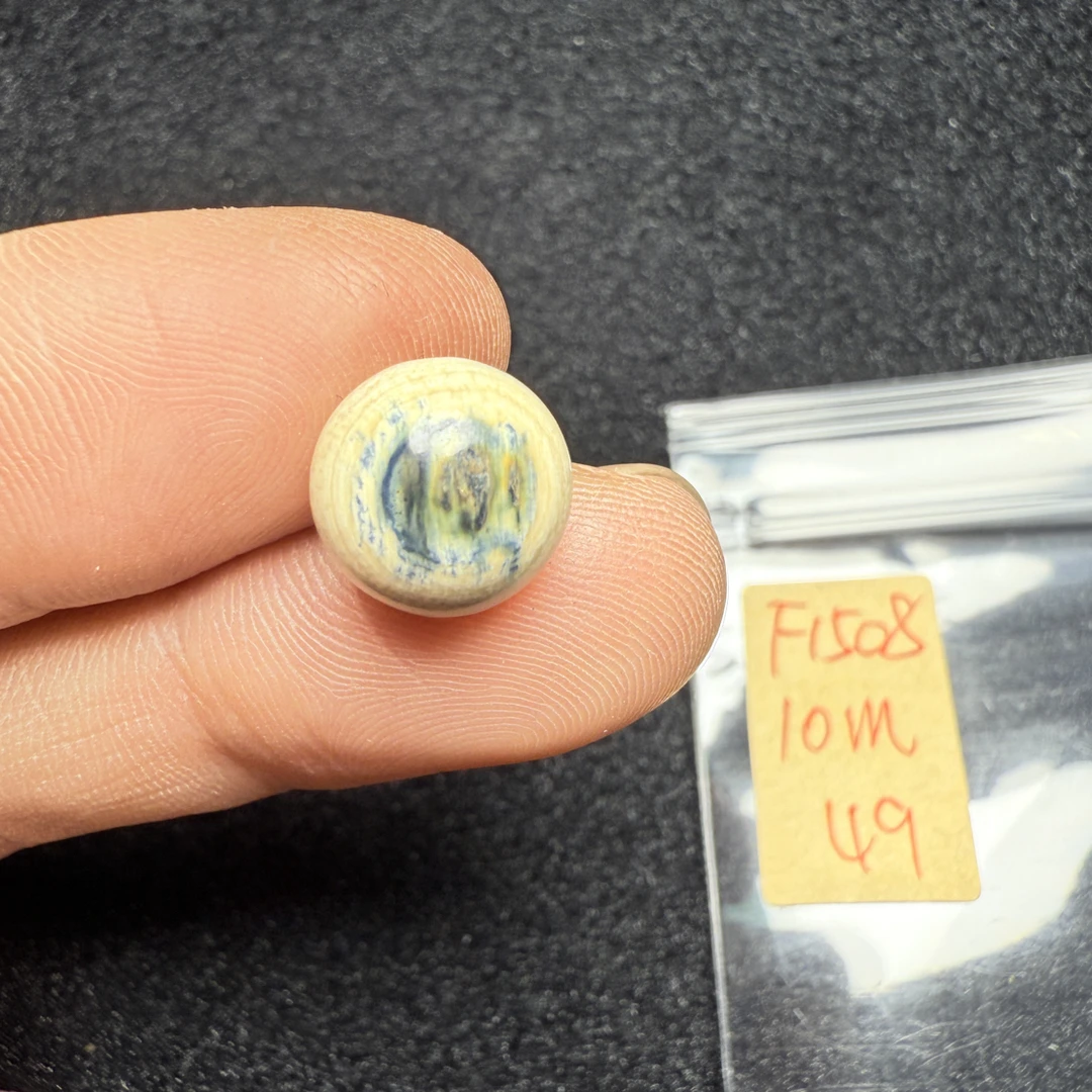 F1508猛犸象牙冰料蓝眼睛圆珠10mm