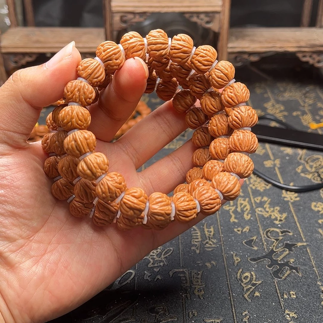 吊坠桃核小金豆手串