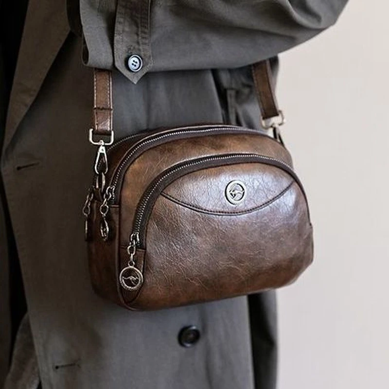 新品斜挎包爆裂软皮小圆包2025新款女士多层单肩百搭时尚大容量