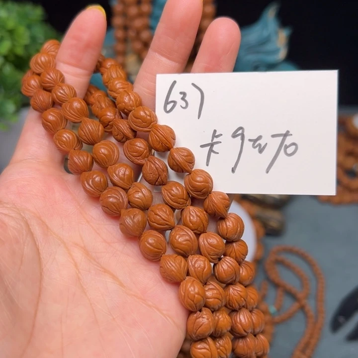 出***沙桃核吊坠秦岭野生龙纹桃核