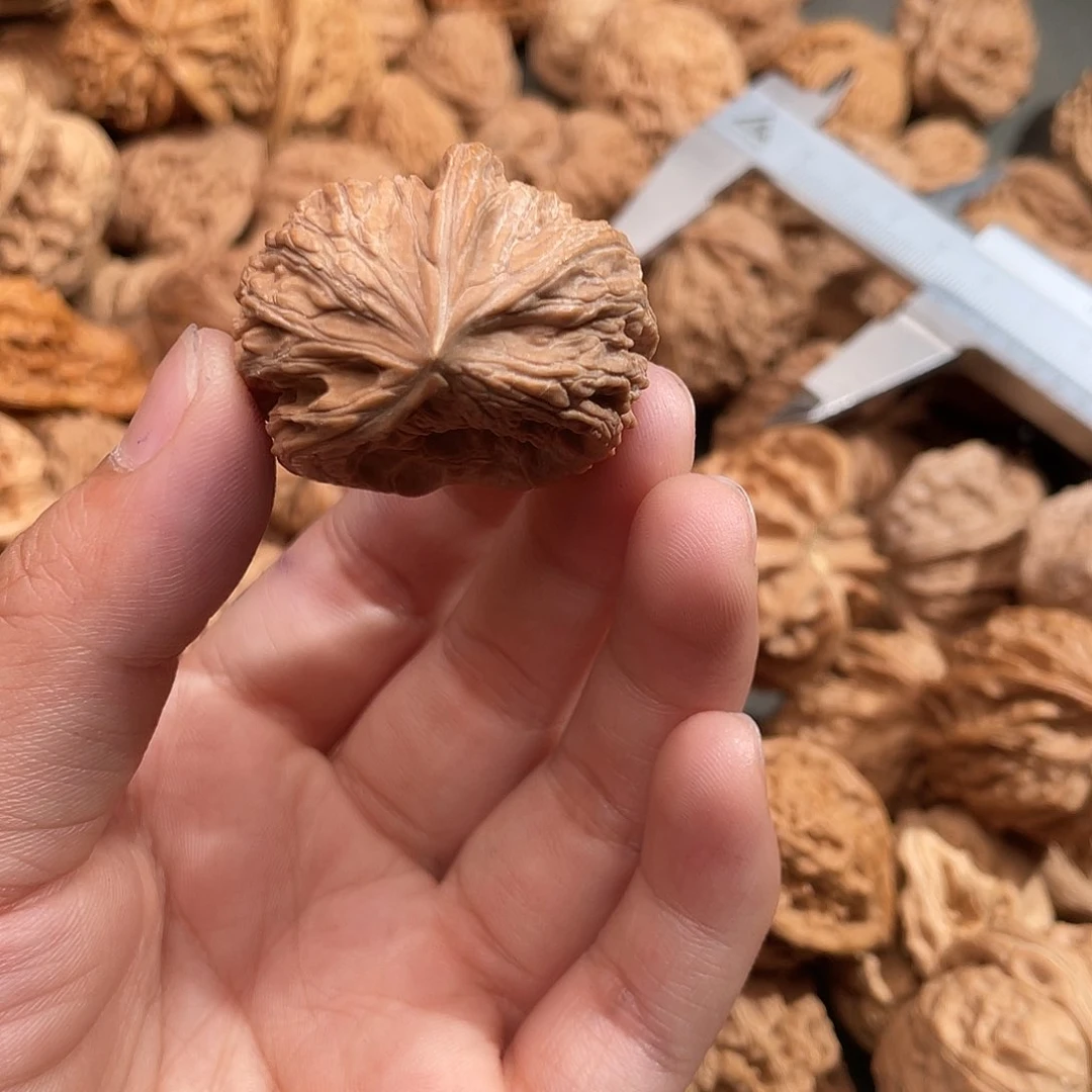 文玩核桃吊坠朱**顺磨盘