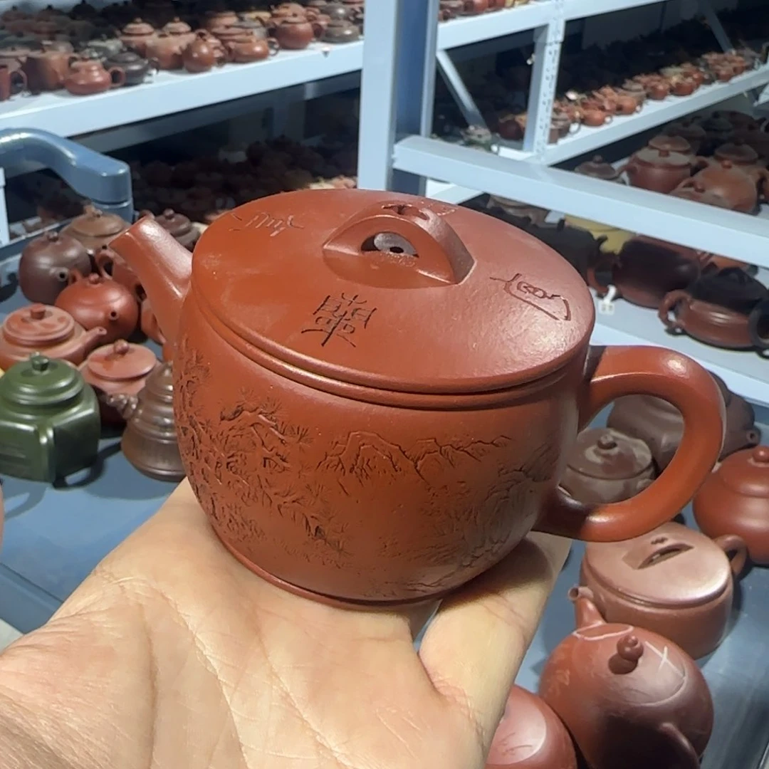 紫砂茶壶朱泥刻绘汉瓦