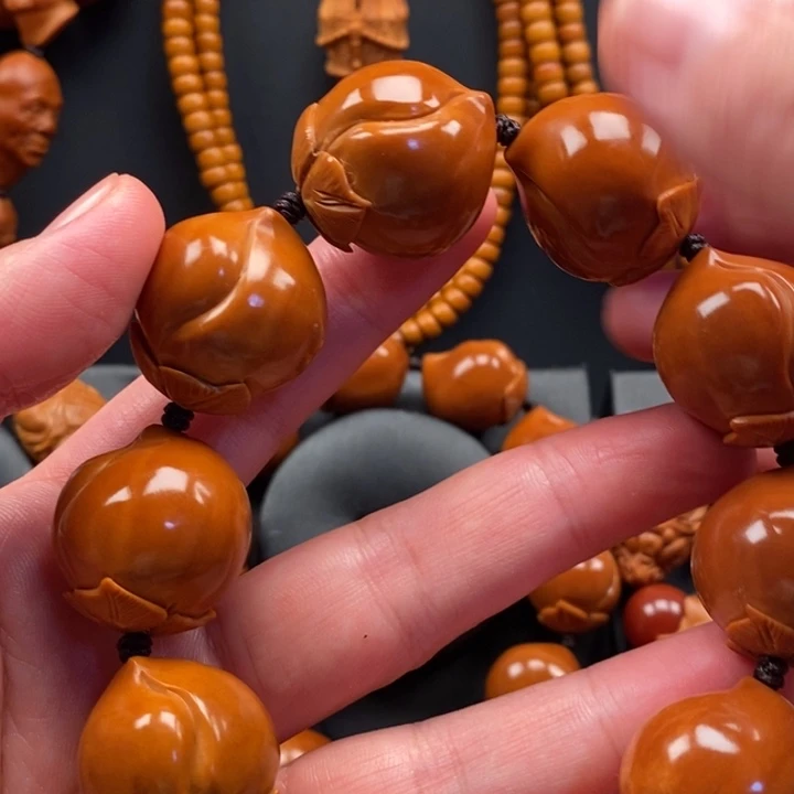 马***砚手串橄榄核22桃子