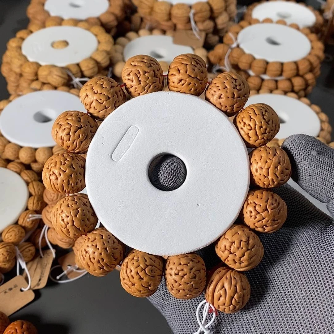 桃核手串一***20盘锦肌肉纹