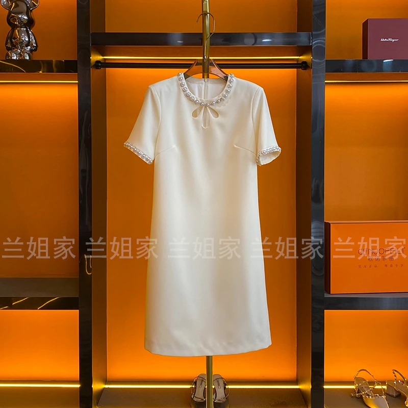 【白色茉莉】设计师2025年夏季新款小香风订珠镂空收腰短袖连衣裙
