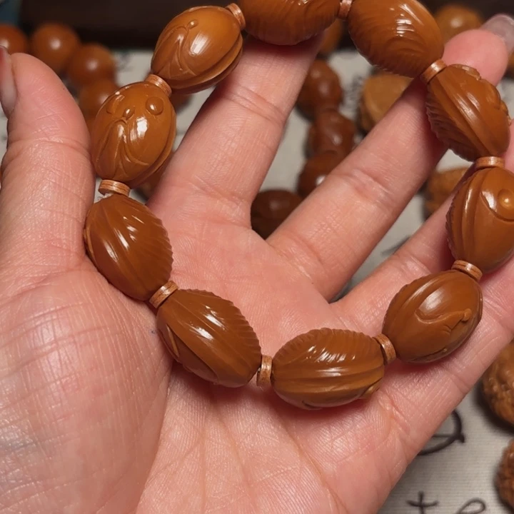 鸿***橄榄核手串/手链1.65太极无相……