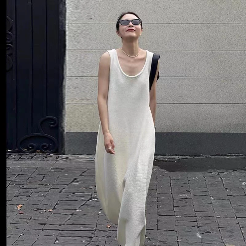 夏季新款宽松遮肉轻熟风吊带裙米白色休闲别致复古连衣裙长裙子