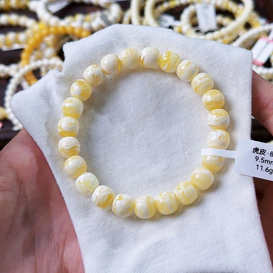 琥珀未镶嵌裸石9.5mm瓷白虎皮妖花