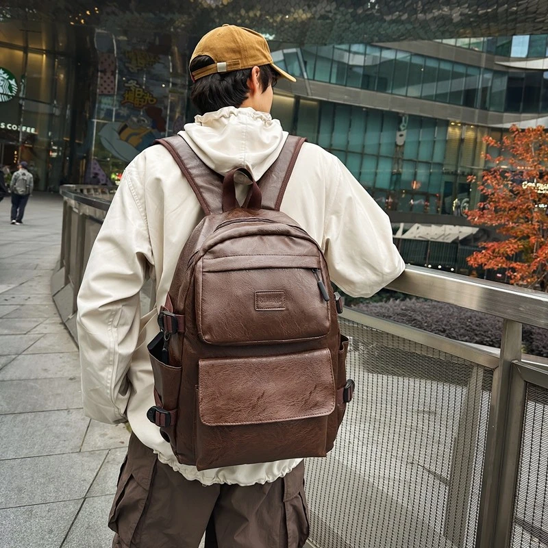 双肩包男士新款ins潮酷初中生高中大学生书包大容量pu皮旅行背包