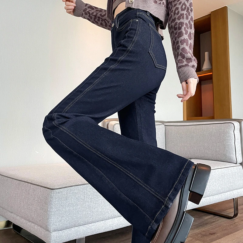 蜜蜜穿搭丹宁蓝修身微喇牛仔裤女2025冬侧边拼接弹力喇叭马蹄裤子