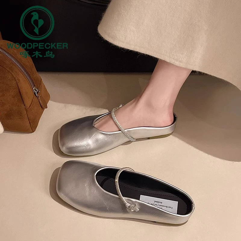 啄木鸟包头半拖鞋女春季2025新款时尚方头一字带水钻平底穆勒凉拖