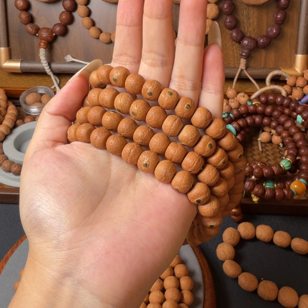 把件凤眼菩提精工藏切/11mm/长串/铜钉