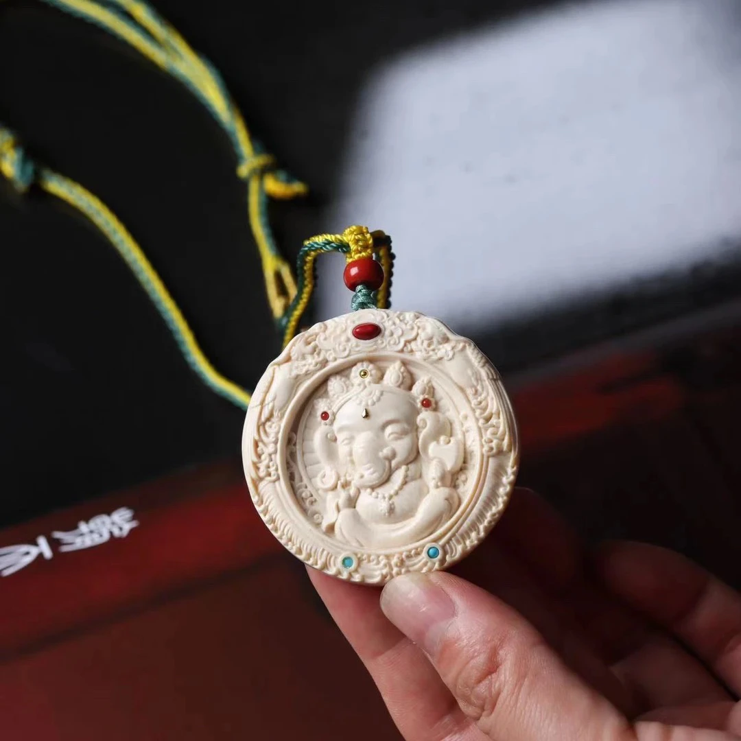 H1088天然猛犸牙 象神圆牌47x8mm18.6克支持鉴定 假一罚四