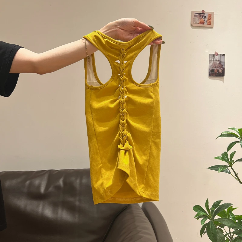 姜黄纯欲辣妹收腰显瘦后背镂空打底背心吊带小上衣女2026夏季